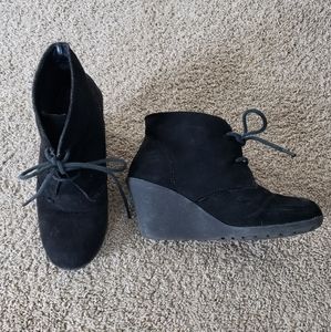 Black wedge booties